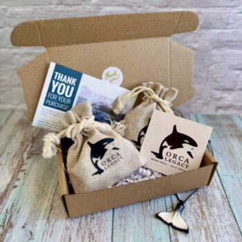 Orca Legacy whale jewelry packaging
